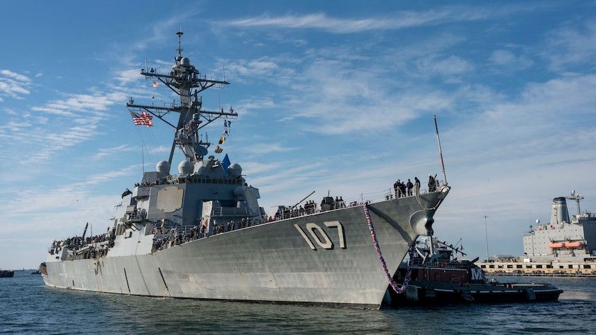 The Arleigh Burke-class guided-missile destroyer USS Gravely (DDG 107) returns to Naval Station Norfolk