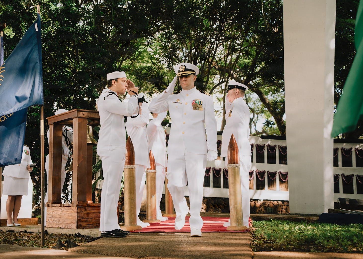 JOINT BASE PEARL HARBOR-HICKAM, Hawaii (Jan. 16, 2026) - Cmdr. Jeffrey Vandenengel, commanding officer of Virginia-class fast-attack submarine USS Illinois (SSN 786), salutes the sideboys as he departs the change of command ceremony for Illinois at the USS Parche Park and Submarine Memorial on Joint Base Pearl Harbor-Hickam, Hawaii, Jan. 16, 2026. Illinois is assigned to Submarine Squadron 1 and is capable of supporting various missions, including anti-submarine warfare, anti-surface ship warfare, strike warfare, special operations forces support, and intelligence, surveillance, and reconnaissance. (U.S. Navy photo by Mass Communication Specialist 2nd Class Nicholas Russell)