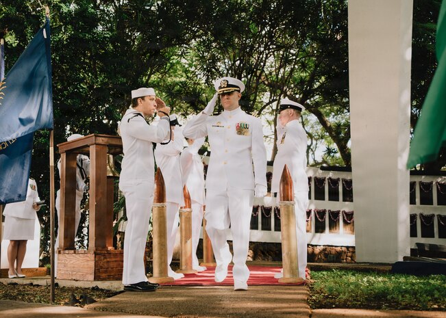 JOINT BASE PEARL HARBOR-HICKAM, Hawaii (Jan. 16, 2026) - Cmdr. Jeffrey Vandenengel, commanding officer of Virginia-class fast-attack submarine USS Illinois (SSN 786), salutes the sideboys as he departs the change of command ceremony for Illinois at the USS Parche Park and Submarine Memorial on Joint Base Pearl Harbor-Hickam, Hawaii, Jan. 16, 2026. Illinois is assigned to Submarine Squadron 1 and is capable of supporting various missions, including anti-submarine warfare, anti-surface ship warfare, strike warfare, special operations forces support, and intelligence, surveillance, and reconnaissance. (U.S. Navy photo by Mass Communication Specialist 2nd Class Nicholas Russell)