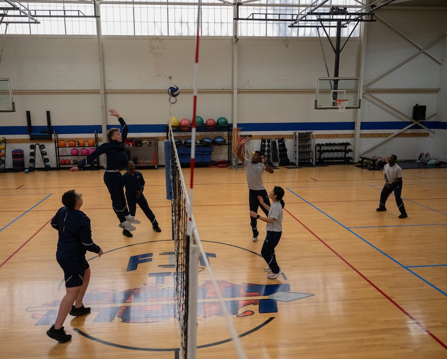 Participants in the First Term Enlisted Course (FTEC) play volleyball at Altus Air Force Base, Oklahoma, Jan. 13, 2026. FTEC participants played volleyball to reinforce teamwork skills and further develop their leadership and followership qualities. (U.S. Air Force Photo by Airman 1st Class Emma Wright)