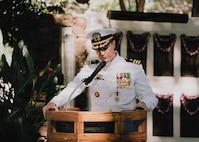 JOINT BASE PEARL HARBOR-HICKAM, Hawaii (Jan. 16, 2026) - Cmdr. Johannes Smith, outgoing commanding officer of the Virginia-class fast-attack submarine USS Illinois (SSN 786), gives remarks during the change of command ceremony for Illinois at the USS Parche Park and Submarine Memorial on Joint Base Pearl Harbor-Hickam, Hawaii, Jan. 16, 2026. Illinois is assigned to Submarine Squadron 1 and is capable of supporting various missions, including anti-submarine warfare, anti-surface ship warfare, strike warfare, special operations forces support, and intelligence, surveillance, and reconnaissance. (U.S. Navy photo by Mass Communication Specialist 2nd Class Nicholas Russell)