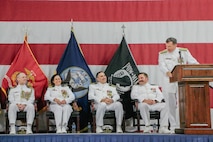 VIRGINIA BEACH, Virginia (Aug. 28, 2025) – Sailors assigned to the commander, Undersea Surveillance (CUS) color guard present colors during a change of command ceremony for CUS held at the Center for Naval Aviation Technical Training Unit in Virginia Beach, Virginia, Aug. 28, 2025. During the ceremony, Capt. Steven Lawrence, from Bridgeport, Pennsylvania, relieved Capt. Stephany Moore, from Caledonia, New York as commander of CUS. CUS provides global maritime acoustic surveillance and timely, accurate anti-submarine warfare (ASW) reporting using persistent, long-range, fixed and mobile systems. (U.S. Navy photo by Yeoman 1st Class Nikolas Cantu)