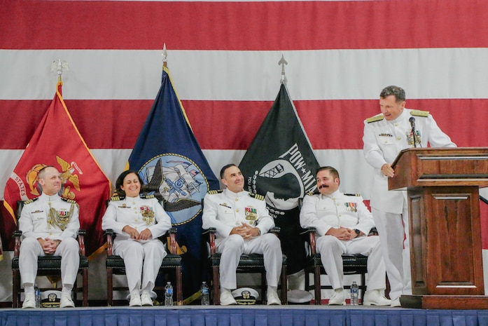 VIRGINIA BEACH, Virginia (Aug. 28, 2025) – Sailors assigned to the commander, Undersea Surveillance (CUS) color guard present colors during a change of command ceremony for CUS held at the Center for Naval Aviation Technical Training Unit in Virginia Beach, Virginia, Aug. 28, 2025. During the ceremony, Capt. Steven Lawrence, from Bridgeport, Pennsylvania, relieved Capt. Stephany Moore, from Caledonia, New York as commander of CUS. CUS provides global maritime acoustic surveillance and timely, accurate anti-submarine warfare (ASW) reporting using persistent, long-range, fixed and mobile systems. (U.S. Navy photo by Yeoman 1st Class Nikolas Cantu)