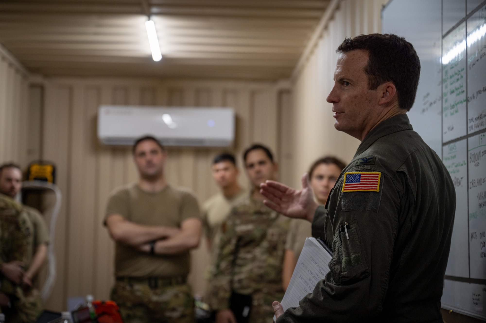 U.S. Air Force Col. Justin Diehl, 317th Airlift Wing commander, briefs Airmen during Exercise Palmetto Reach at Saipan International Airport, Saipan, Jan. 17, 2026. The 317th AW participated as a guest unit at the invitation of the 437th Airlift Wing from Joint Base Charleston, South Carolina, leveraging their Combat Readiness Exercise to showcase long-range C-130J operations and reinforce the Air Force’s global power projection and readiness posture. (U.S. Air Force photo by Airman 1st Class Adrien Tran)