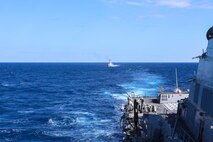 U.S. Navy Arleigh Burke-class guided-missile destroyer USS John Finn (DDG 113) sails in formation with Philippine Navy Jose Rizal-class frigate BRP Jose Rizal (FF-150) during the Maritime Cooperative Activity (MCA) in the Philippines’ Exclusive Economic Zone, Jan. 26, 2026.