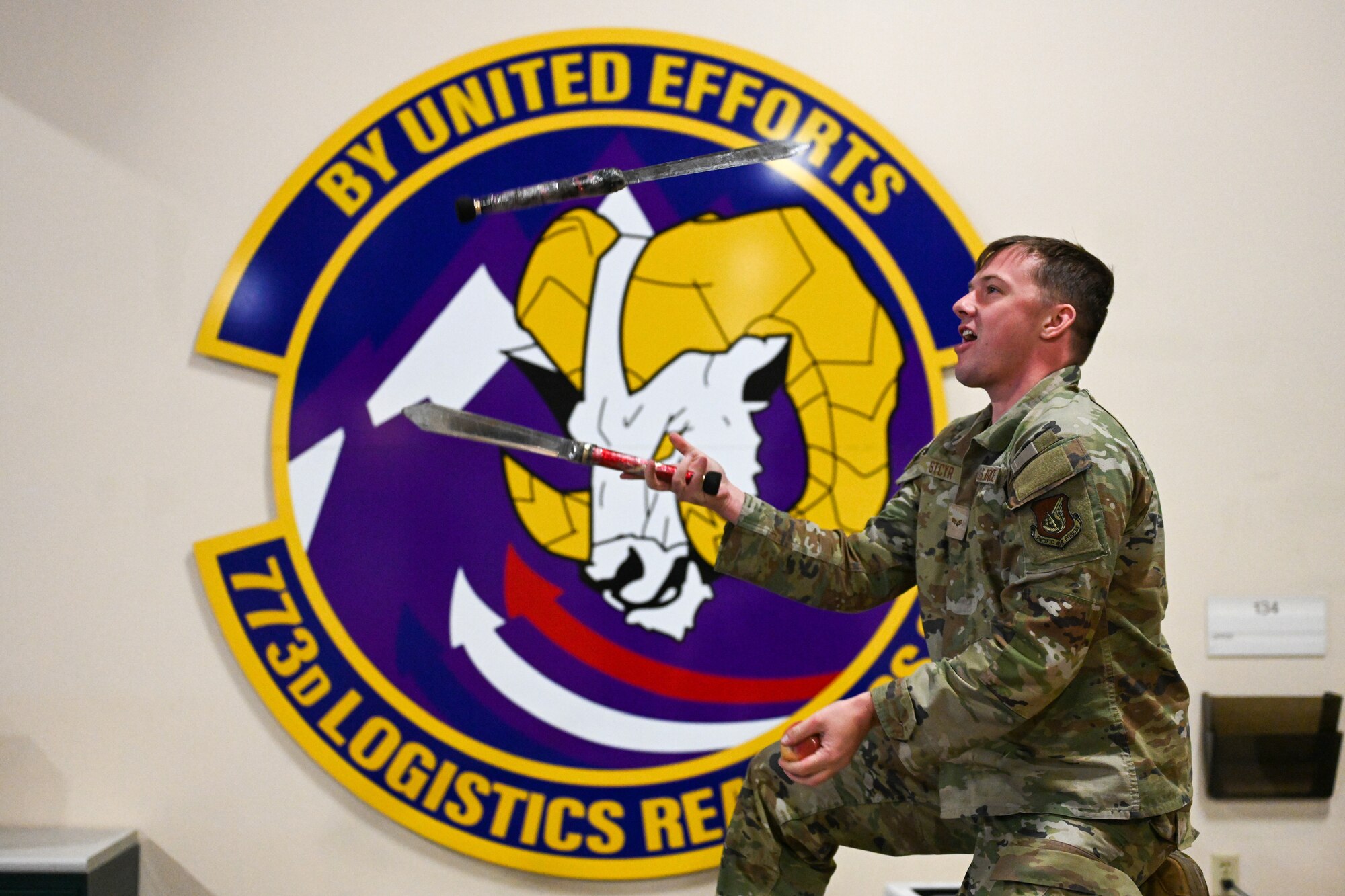 Senior Airman Rick Stcyr juggles knives on Joint Base Elmendorf-Richardson, Alaska, Dec. 2, 2025. Stcyr has been practicing for over a decade, demonstrating how discipline and consistency are crucial to success.  (U.S. Air Force photo by Airman 1st Class Eli A. Rose)