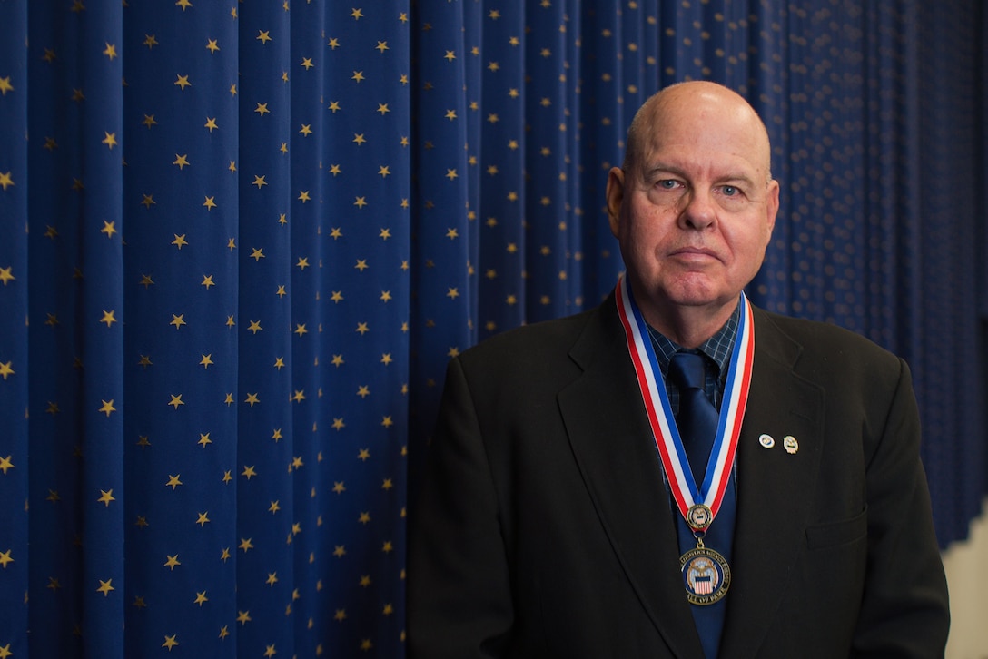 A person poses for a photo.