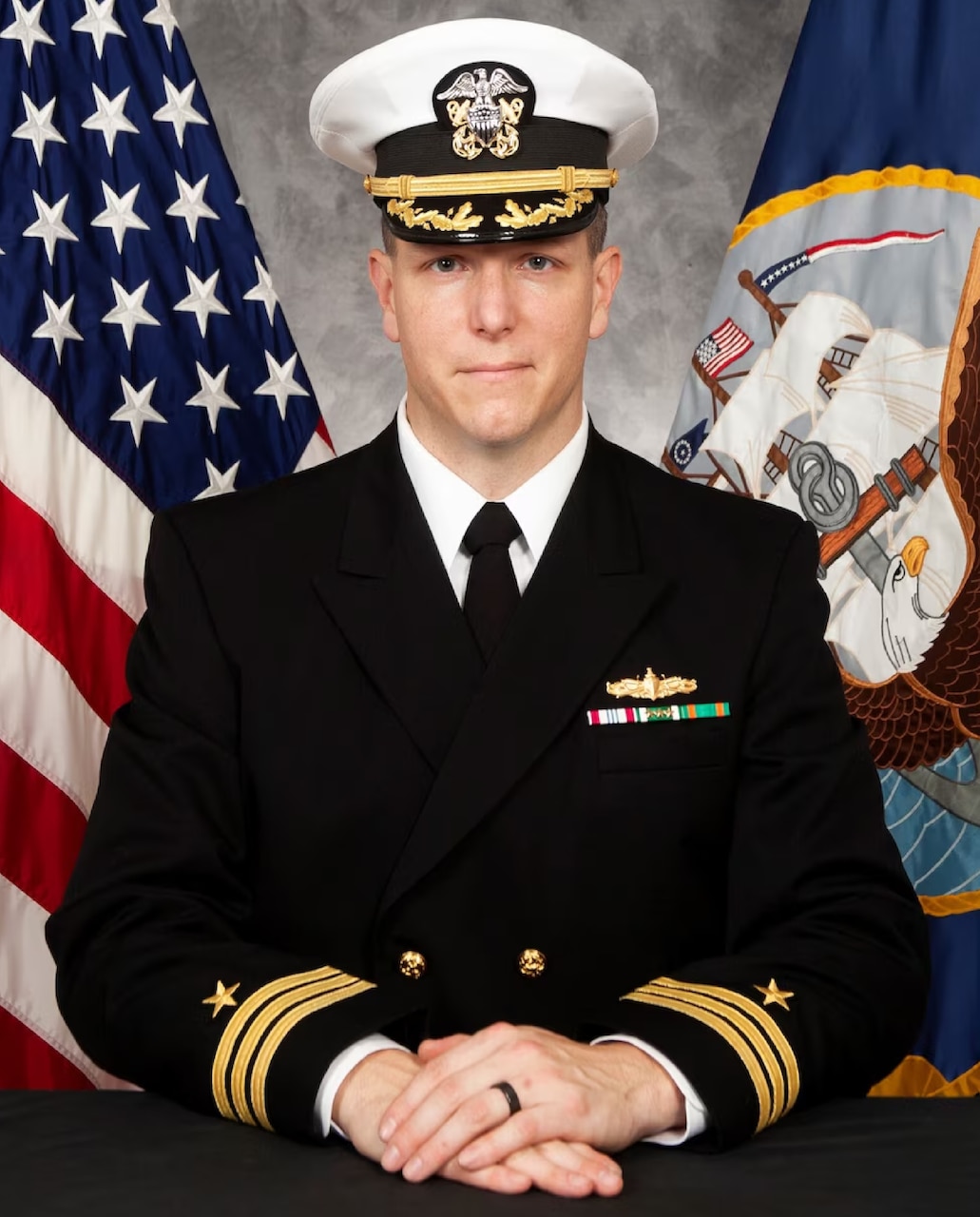 Commander Michael Hughes