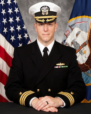 Commander Michael Hughes