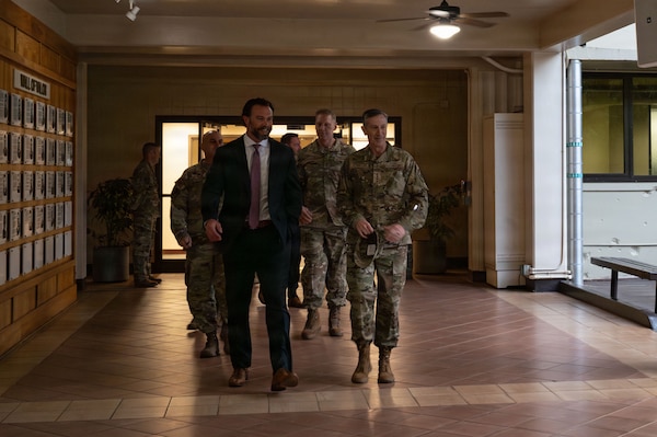 Under Secretary of the Air Force Matt Lohmeier walks with Gen. Kevin Schneider, Pacific Air Forces commander