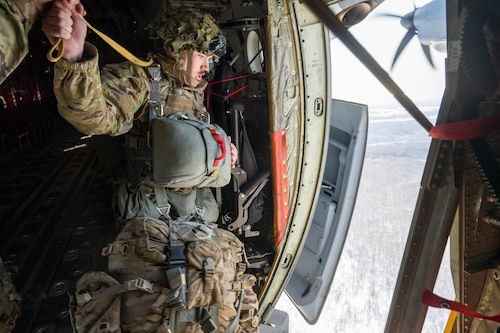 A U.S. Army paratrooper assigned to the 11th Airborne Division, 2nd Brigade, executes a static line jump during exercise North Wind 26.