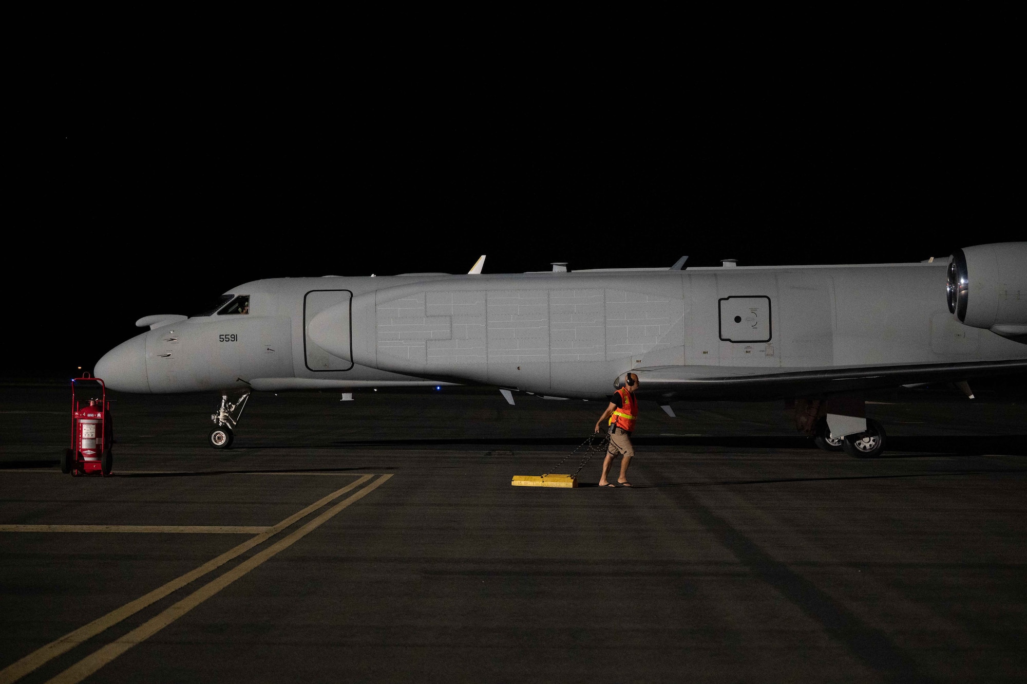 A U.S. Air Force EA-37B Compass Call parks on a flightline at Joint Base Pearl Harbor-Hickam, Hawaii, Sept. 29, 2025. As a force multiplier, the EA-37B directly enables other assets in multiple domains to operate effectively against sophisticated defense. (U.S. Air Force photo by Senior Airman Mark Sulaica)