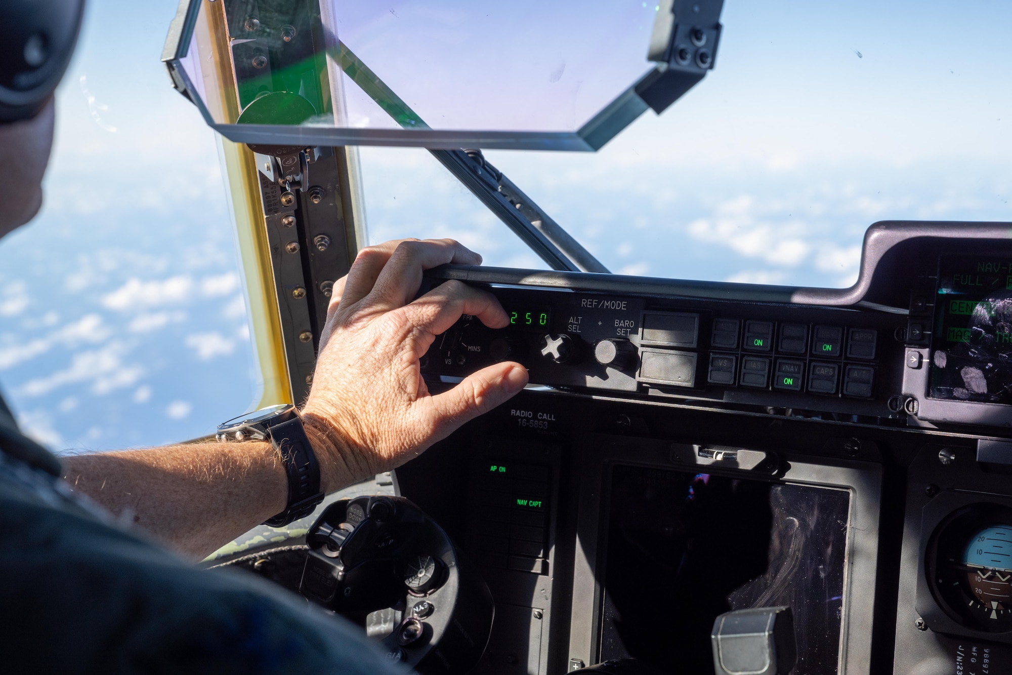 U.S. Air Force Col. Justin Diehl, 317th Airlift Wing commander, performs flight checks in a C-130J Super Hercules during a Maximum Endurance Operation en-route to Won Pat International Airport, Guam, for exercise Palmetto Reach, Jan. 14, 2026. The MEO demonstrated the wing’s ability to extend operational reach and sustain airpower across vast distances in support of theater mobility requirements. (U.S. Air Force photo by Airman 1st Class Adrien Tran)