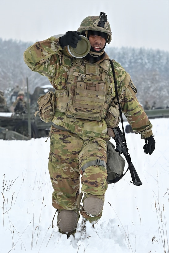 U.S. Paratroopers assigned to 4th Battalion, 319th Field Artillery Regiment, 173rd Airborne Brigade, prepare, load and fire an M777 Howitzer during Dynamic Front 26 at the Grafenwoehr Training Area, Grafenwoehr, Germany, Jan. 27, 2026. Dynamic Front is the practical application of the Eastern Flank Deterrence Line (EFDL) and enhances the U.S. and NATO's ability to coordinate lethal and non-lethal effects in a distributed battlefield. (U.S. Army photo by Pfc. Tomas J. Arce)