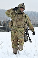 U.S. Paratroopers assigned to 4th Battalion, 319th Field Artillery Regiment, 173rd Airborne Brigade, prepare, load and fire an M777 Howitzer during Dynamic Front 26 at the Grafenwoehr Training Area, Grafenwoehr, Germany, Jan. 27, 2026. Dynamic Front is the practical application of the Eastern Flank Deterrence Line (EFDL) and enhances the U.S. and NATO's ability to coordinate lethal and non-lethal effects in a distributed battlefield. (U.S. Army photo by Pfc. Tomas J. Arce)