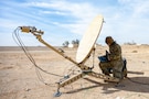 U.S. Air Force Senior Airman Rachel Cajucom, 386th Expeditionary Communications Squadron radio frequency technician, tests an antenna’s connection status during a readiness and dispersal exercise within the U.S. Central Command area of responsibility, Jan. 26, 2026. Training across multiple locations increases adaptability, enabling combat-ready Airmen to operate effectively despite distance, resources, or limited infrastructure. (U.S. Air Force photo by Staff Sgt. Nathan Wingate)