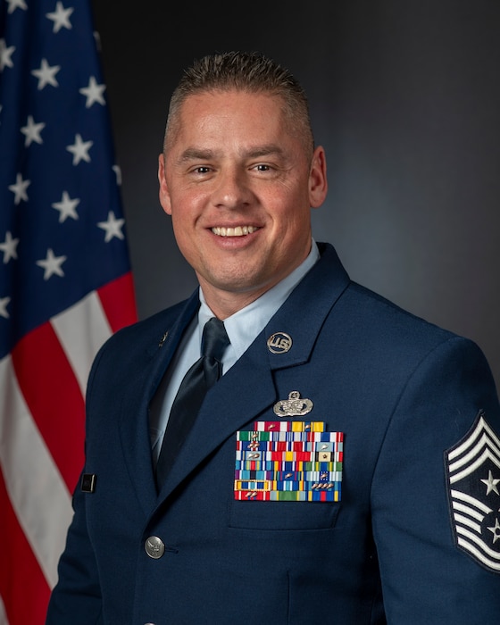 Official portrait of Chief Master Sgt. Jeremy Hancock.