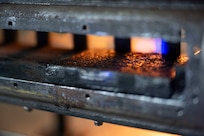 Featured is a carbon black composite fuel slab within an optically-accessible solid-fuel slab burner combustion chamber at the U.S. Naval Research Laboratory’s (NRL) Combustion Lab in Chesapeake Beach, Maryland, Jan. 15, 2026. Researchers and engineers at NRL use an optically-accessible solid-fuel slab burner to perform combustion experiments at conditions relevant to solid-fuel ramjet flight. (U.S. Navy photo by Jonathan Sunderman)