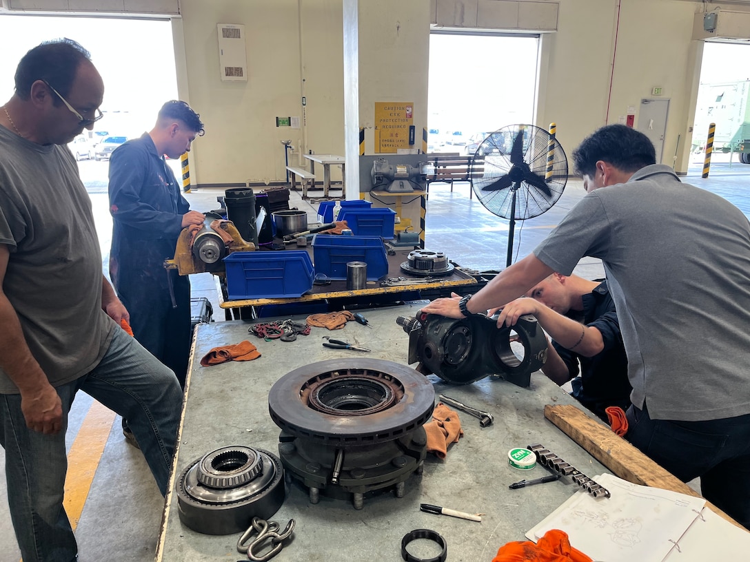 Marines with the General Support Maintenance Platoon, Intermediate Repair Company, 3d Maintenance Battalion, 3d Marine Logistics Group, conduct work on an Amphibious Combat Vehicle wheel end assembly at Camp Kinser, Okinawa, Japan, Nov. 13, 2025. Marines with the GSM Platoon, in concert with 3d Maint. Bn’s Manufacturing Platoon, has been building their ACV secondary repairable capabilities beyond the traditional scope of an intermediate-level repair facility, out-pacing Marine Corps Logistics Command to support the overall readiness of III Marine Expeditionary Force’s ACV units.