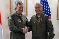 U.S. Air Force Maj. Gen. Gary Keefe, the adjutant general of the Massachusetts National Guard, left, awards Paraguayan Air Force Commander Gen. Julio Rubén Fullaondo Céspedes with the Medal of Merit in Asunción, Paraguay, Jan. 21, 2026. The award recognizes Fullaondo’s leadership and contributions to strengthening aviation cooperation, interoperability and international partnerships between the Massachusetts National Guard and the Paraguayan Armed Forces.