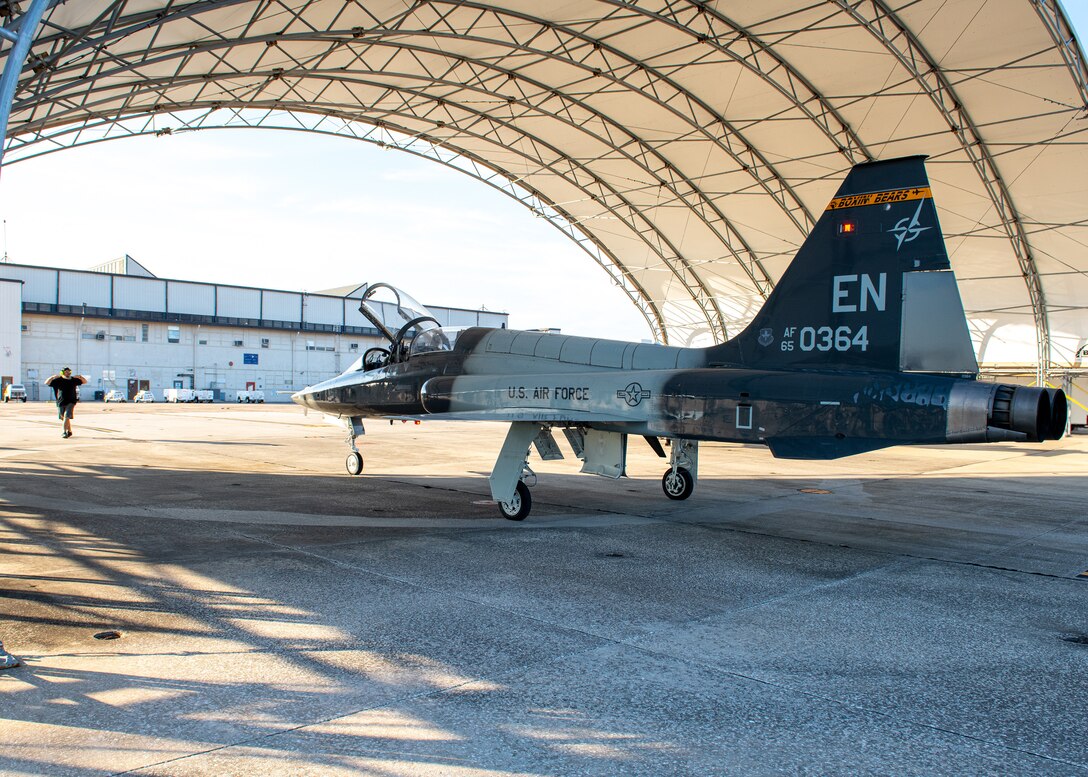251124-N-DG679-2012 

JACKSONVILLE, Fla. (Nov. 24, 2025) – An Air Force T-38 Talon taxis to an aircraft shelter at the Fleet Readiness Center Southeast (FRCSE). This is FRCSE’s first T-38, which will undergo overhaul and repair as part of the Talon Repair, Inspection, and Maintenance program (TRIM). The TRIM program is an Air Force initiative that involves inspecting and replacing key structural components across the entire T-38 fleet, with the goal of extending the aircraft's operational life by five to 10 years. (U.S. Navy photo by Toiete Jackson)