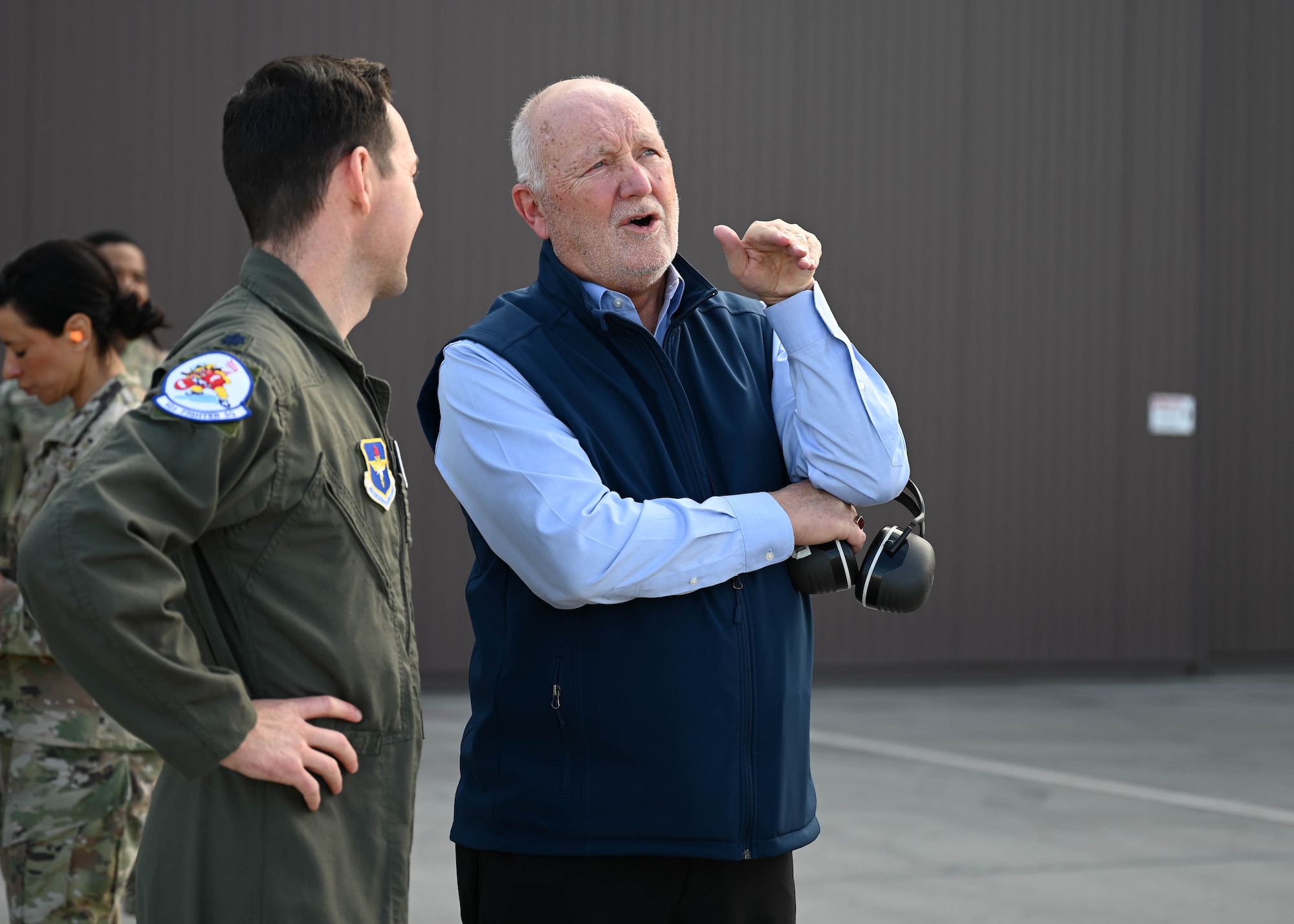 The Honorable Peter Hoekstra, U.S. Ambassador to Canada, discusses training operations with a U.S. Air Force F-35 Lightning II pilot during a tour, Jan. 22, 2026, at Luke Air Force Base, Arizona. As Canada prepares to bring the F-35 Lighting II online, Luke is positioned to support initial training for Royal Canadian Air Force F-35 pilots. Shared training builds trust and interoperability from day one.