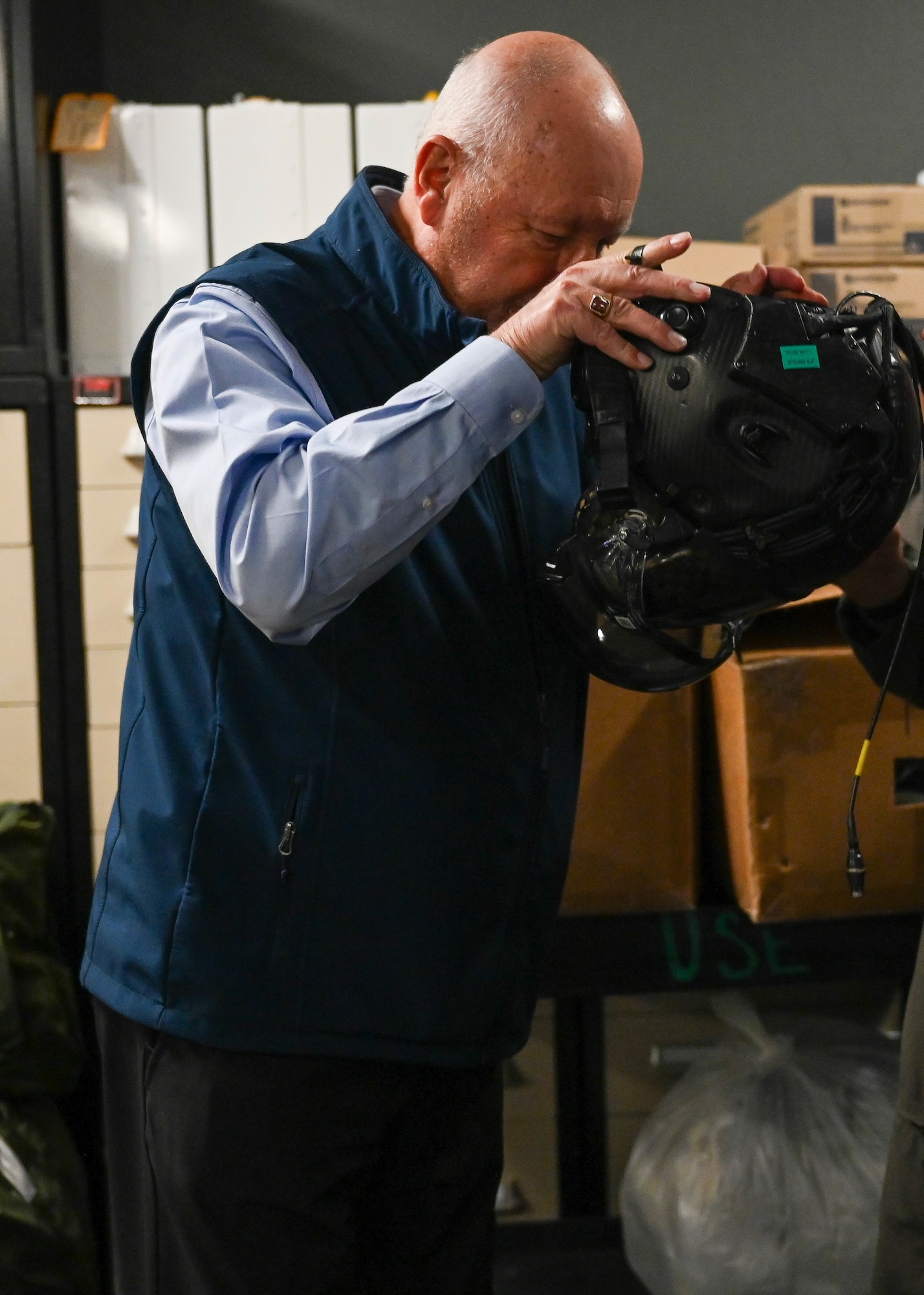 The Honorable Peter Hoekstra, U.S. Ambassador to Canada, puts on flight equipment, Jan. 22, 2026, at Luke Air Force Base, Arizona. The visit highlighted Luke’s role in preparing for future Royal Canadian Air Force F-35 Lightning II pilot training. Training alongside partner nations strengthens interoperability and shared operational standards across allied air forces.