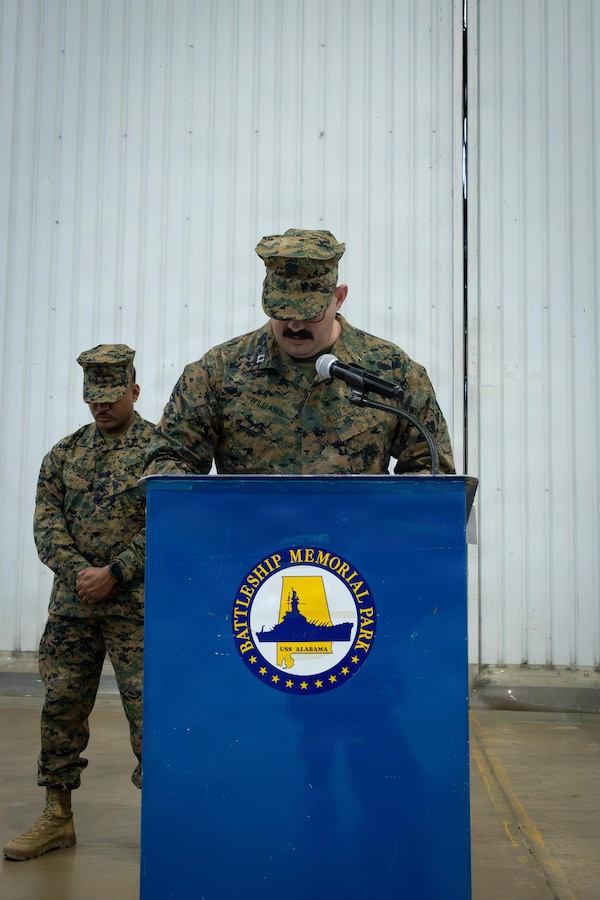 U.S. Navy Lt. John Williams, a chaplain with 4th Reconnaissance Battalion, gives an invocation during a relief in place/transfer of authority ceremony at the USS Alabama Battleship Memorial Park Museum in Mobile, Alabama, Jan. 24, 2026. The ceremony marks the continued legacy of Force Reconnaissance units in Mobile, symbolizing a proud tradition of service and sacrifice dating back to the Gulf War. (U.S. Marine Corps photo by Lance Cpl. Claire Cheney)