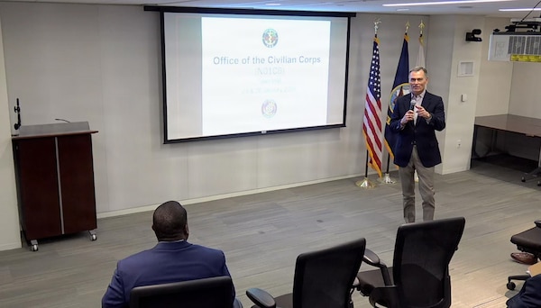 260123-N-MS174-1001 (Jan. 23, 2026) FALLS CHURCH, Va. Dr. Michael B. McGinnis, executive director of U.S. Navy Bureau of Medicine and Surgery, and director of the Navy Medicine Civilian Corps, speaks during a town hall at Defense Health Headquarters, Jan. 23. With a community of more than 2,000 civilian employees in over 119 different occupations across the globe, the Navy Medicine Civilian Corps play a critical and foundational role in helping the Department of the Navy meet its mission and support our warfighters. (U.S. Navy screenshot by Bobbie A. Camp)