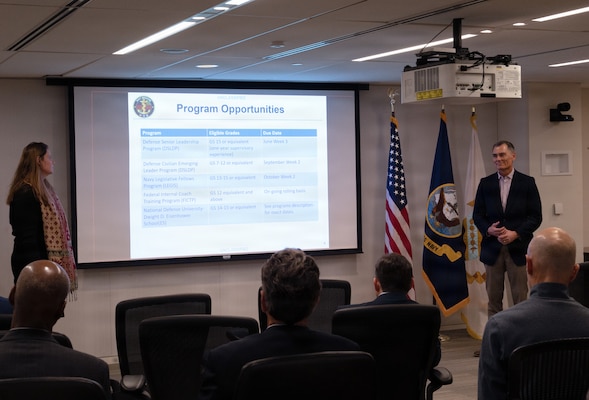 260123-N-CH185-1003 (Jan. 23, 2026) FALLS CHURCH, Va. Genevieve Landers, the program support specialist for the Navy Medicine Civilian Corps at the U.S. Navy Bureau of Medicine and Surgery, speaks during a town hall at Defense Health Headquarters, Jan. 23. With a community of more than 2,000 civilian employees in over 119 different occupations across the globe, the Navy Medicine Civilian Corps play a critical and foundational role in helping the Department of the Navy meet its mission and support our warfighters. (U.S. Navy photo by Kaylon Chladek)