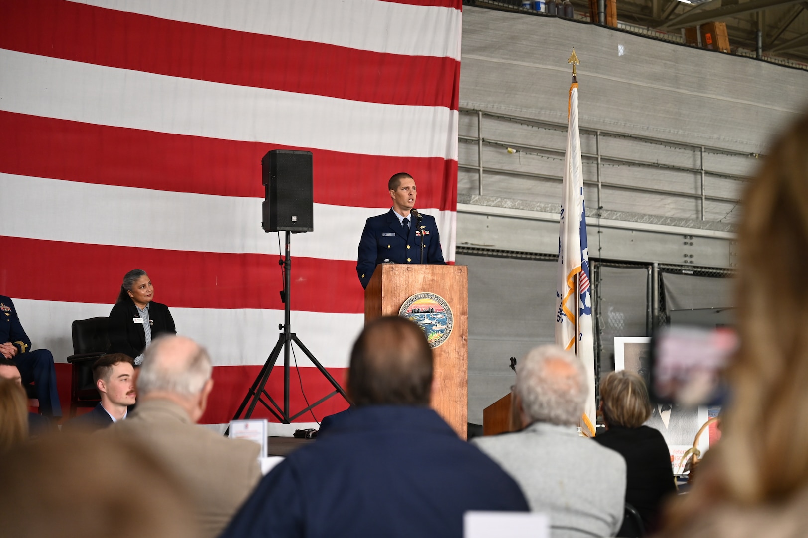 Petty Officer 1st Class William James, a Sector San Diego Aviation Electronics Technician, gives a speech to the audience at the Coastie of the Year awards ceremony at Coast Guard Sector San Diego, Jan. 28, 2026. The annual award recognizes exemplary Coast Guard members from San Diego’s five local units. (U.S. Coast Guard photo by Petty Officer 3rd Class Trinity Whalen)
