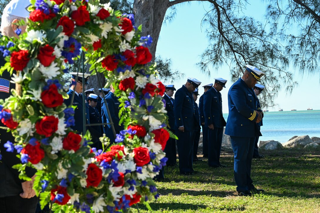 Coast Guard members from Sector St. Petersburg bow their heads at the memorial of the USCGC Blackthorn in St. Petersburg, Florida on Jan. 28, 2026. The USCGC Blackthorn collided with the tanker SS Capricorn, a large commercial oil tanker, near the skyway bridge which resulted in 23 members of the crew's lives to be lost. (U.S. Coast Guard photo by Petty Officer 1st Class Riley Perkofski)