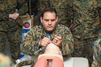 260122-N-FB730-1005 CAMP LEJEUNE. (January 22, 2026) A Hospital Corpsman intubates a manikin during a skill sustainment training with the Healthcare Simulation and Bioskills Center on January 22, 2026. The training focused on life saving medical techniques needed to ensure Sailors provide efficient medical care. (U.S. Navy photo by Mass Communications Specialist second class Justin Woods)