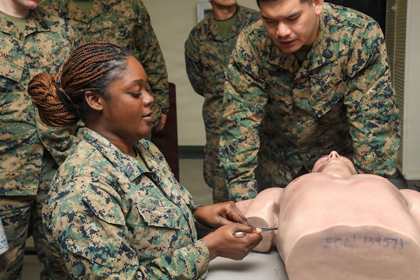 260122-N-FB730-1023 CAMP LEJEUNE. (January 22, 2026) a Hospital Corpsman does a tube thoracostomy on a manikin during a skill sustainment training with the Healthcare Simulation and Bioskills Center on January 22, 2026. The training focused on life saving medical techniques needed to ensure Sailors provide efficient medical care. (U.S. Navy photo by Mass Communications Specialist second class Justin Woods)