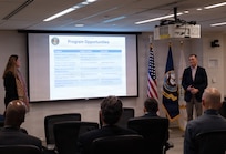 260123-N-CH185-1003 (Jan. 23, 2026) FALLS CHURCH, Va. Genevieve Landers, the program support specialist for the Navy Medicine Civilian Corps at the U.S. Navy Bureau of Medicine and Surgery, speaks during a town hall at Defense Health Headquarters, Jan. 23. With a community of more than 2,000 civilian employees in over 119 different occupations across the globe, the Navy Medicine Civilian Corps play a critical and foundational role in helping the Department of the Navy meet its mission and support our warfighters. (U.S. Navy photo by Kaylon Chladek)