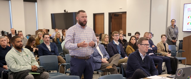People sitting in a briefing.