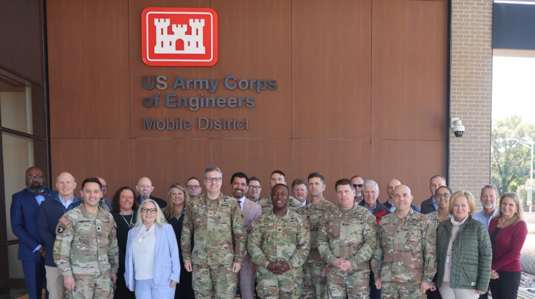 Picture of Leadership in front of a building