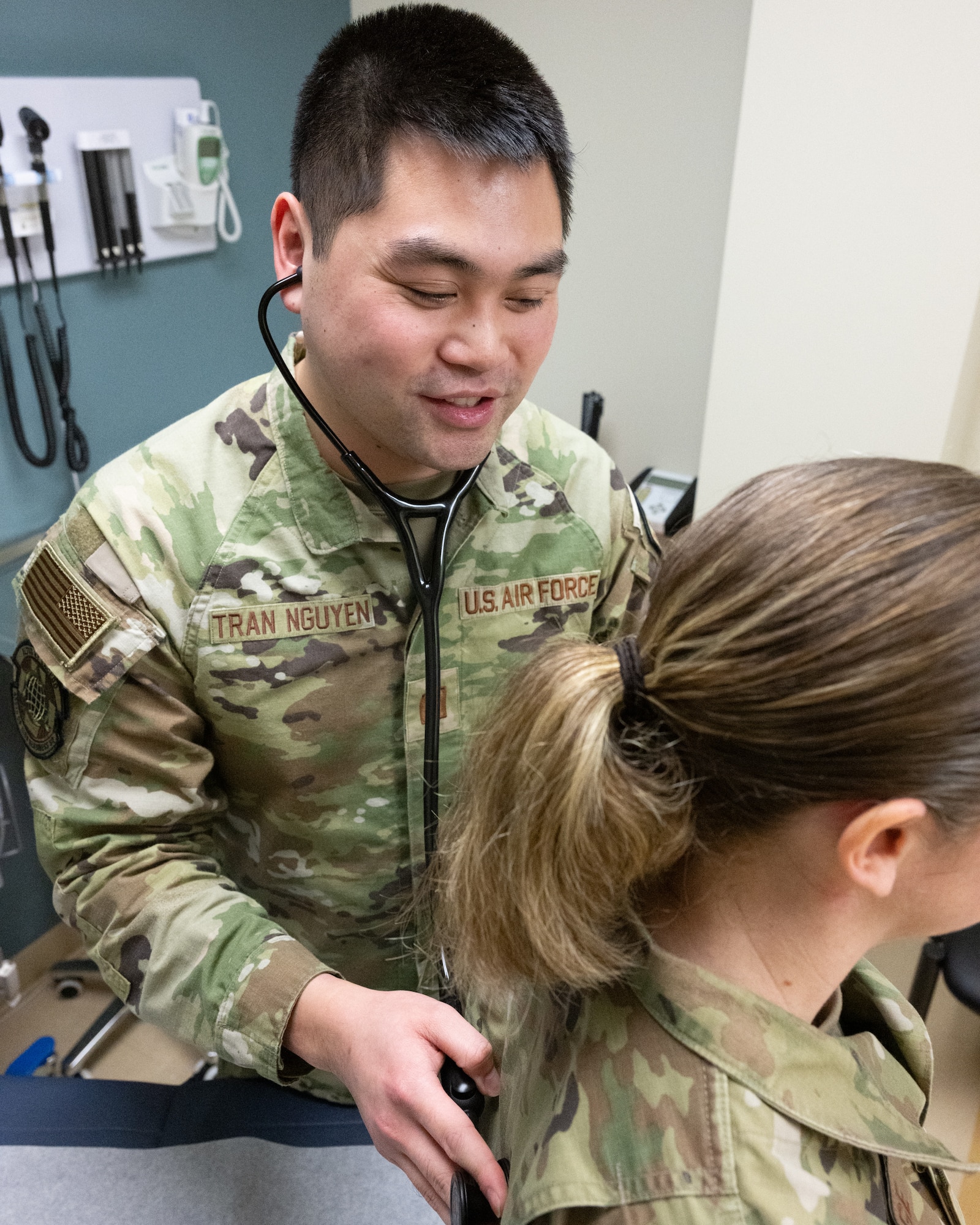 U.S. Air Force Capt. Nam Tran Nguyen, 436th Operational Medical Readiness Squadron physician assistant, performs a lung exam at Dover Air Force Base, Delaware, Jan. 23, 2026. The 436th Medical Group was recently recognized as the 2025 Air Mobility Command clinic of the year, making it the second year in a row the clinic has received the award. (U.S. Air Force photo by Mauricio Campino)