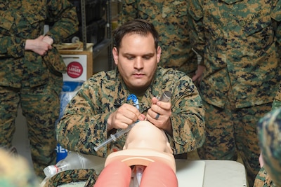 Hospital Corpsman intubates a manikin during a skill sustainment training