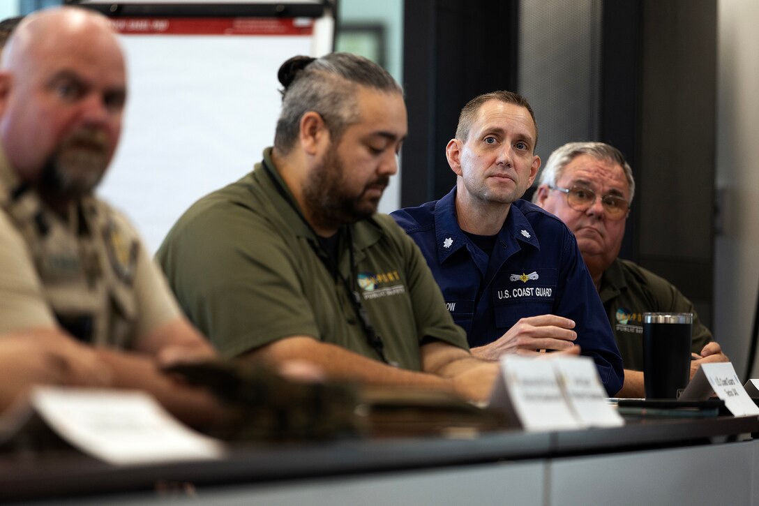 Federal, state, local, military and private-sector partners discuss integrated base defense planning during a preparation session Jan. 15, 2026, at Marine Corps Support Facility Blount Island, Florida. The discussion helped align roles, identify capability gaps and set conditions for a regional planning event Jan. 27–28. (Official Marine Corps photo by Dustin Senger)