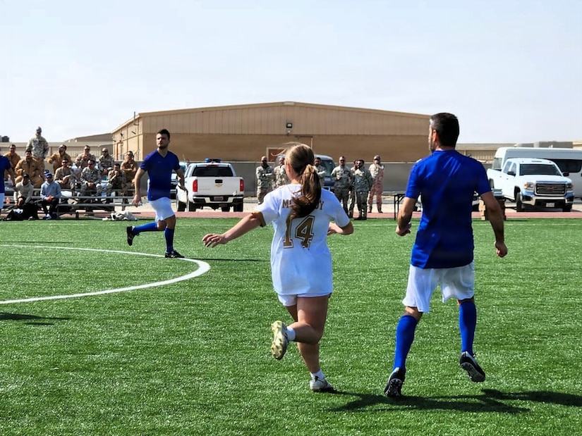 U.S. Army 1st Lt. Daniela McCurdy, a human resources officer with the 213th Personnel Company, 213th Regional Support Group, Pennsylvania National Guard, deployed to Kuwait, awaits a pass during a soccer game in Kuwait, May 2025. (Courtesy Photo)