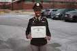 U.S. Army Reserve 1st Lt. Marissa Lomax, a public affairs officer assigned to the 205th Theater Public Affairs Support Element, poses with her certificate of completion for the Public Affairs Communications Strategy Qualification Course at the Defense Information School, Fort George G. Meade, Maryland, Dec. 17, 2025. Lomax’s academic performance and perseverance earned her the distinction of honor graduate. (Courtesy photo)