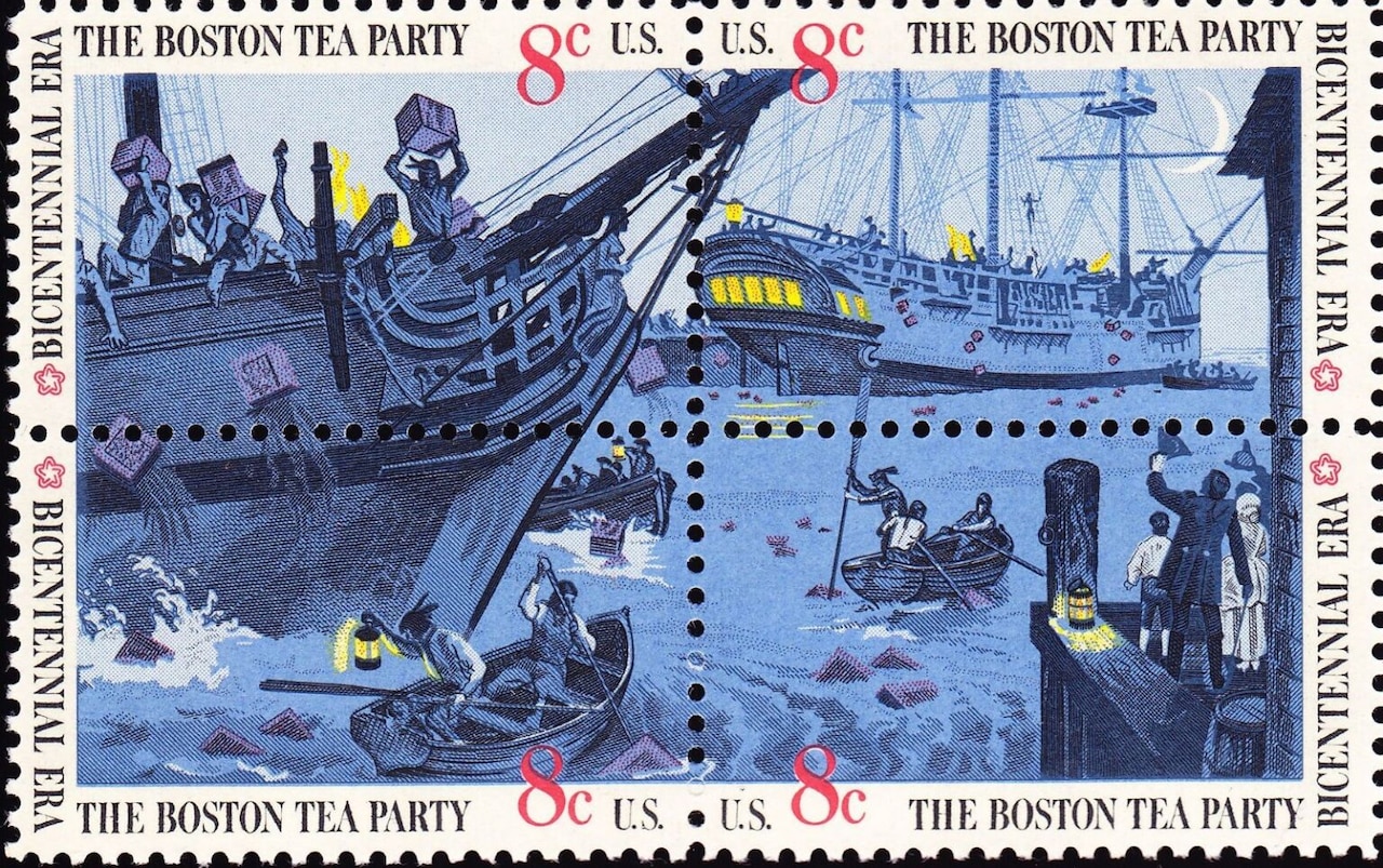 A postage stamp with people on a sailing vessel throwing boxes overboard as others in row boats holding lanterns row at night. Another ship is in the distance, and people are standing on a pier watching the activities.