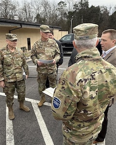 From left, Col. Raymond Ruscoe, U.S. Space Command “South Detachment” deputy director; Maj. Gen. Terry Grisham, USSPACECOM transition team director; and Gen. Stephen Whiting, USSPACECOM commander, listen to a briefing during a tour of facilities at Redstone Arsenal, Alabama, Jan. 29, 2026. Following the President's announcement in September 2025, the command has been working diligently to lay the groundwork for a purpose-built headquarters on Redstone Arsenal while remaining committed to ensuring seamless space operations. The first members of USSPACECOM’s headquarters staff are already on the ground at Redstone Arsenal, forming a dedicated Project Management Office focused on military construction and infrastructure.