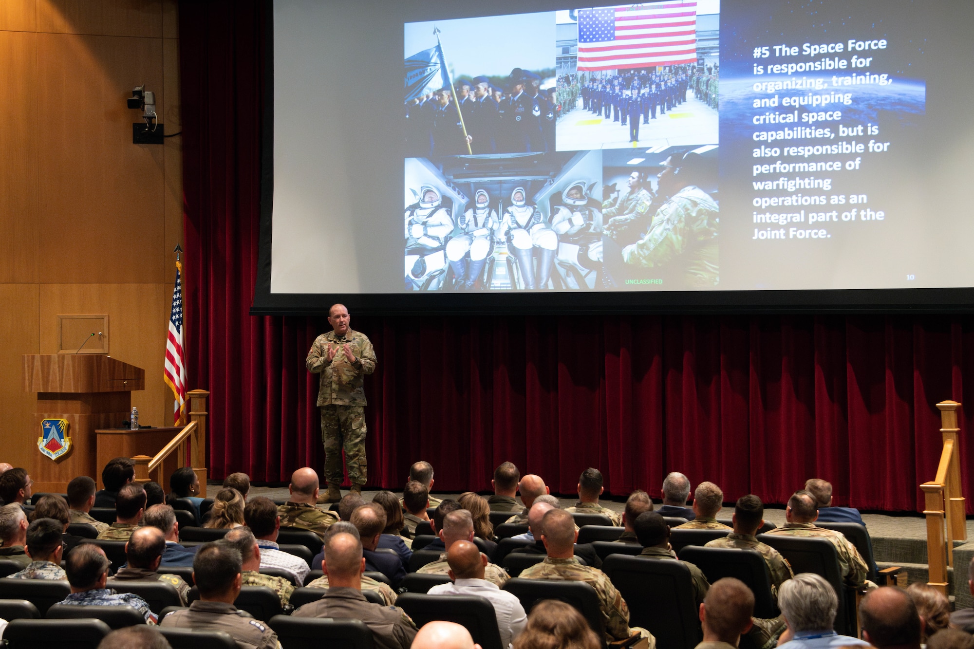 U.S. Space Force Lt. Gen. Douglas A. Schiess, commander of U.S. Space Force - Space; and U.S. Space Command Combined Joint Force Space Component Commander, speaks to members of the 71st National Security Forum on Maxwell Air Force Base, May 8, 2025.  Lt. Gen. Schiess leads thousands of joint and combined personnel across 50 tactical units with a mission to plan, integrate, conduct and assess global space operations in order to deliver combat relevant space effects in, from, and to space for combatant commanders, coalition partners, the Joint Force and the nation. (U.S. Air Force photo by Neo B. Greene III)