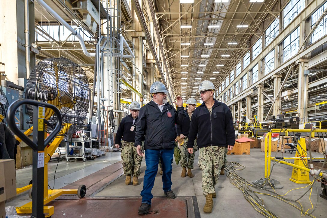 Adm. John Kilby, vice chief of naval operations, tours Building 431 with Tom Duncan, nuclear director, Shop 31, Inside Machinist, Jan. 23, 2026, at Puget Sound Naval Shipyard & Intermediate Maintenance Facility in Bremerton, Washington. (U.S. Navy photo by Jeb Fach)