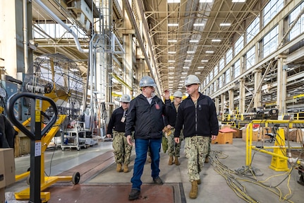 Adm. John Kilby, vice chief of naval operations, tours Building 431 with Tom Duncan, nuclear director, Shop 31, Inside Machinist, Jan. 23, 2026, at Puget Sound Naval Shipyard & Intermediate Maintenance Facility in Bremerton, Washington. (U.S. Navy photo by Jeb Fach)