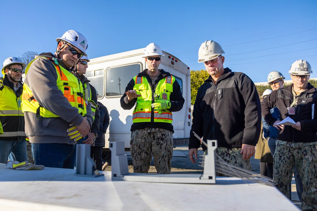 Adm. James Kilby receives a briefing on the progress of the Dry Dock 4 Retrofit Project, Jan. 23, 2026, at Puget Sound Naval Shipyard & Intermediate Maintenance Facility in Bremerton, Washington.
 (U.S. Navy photo by Jeb Fach)