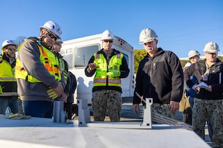 Adm. John Kilby receives a briefing on the progress of the Dry Dock 4 Retrofit Project, Jan. 23, 2026, at Puget Sound Naval Shipyard & Intermediate Maintenance Facility in Bremerton, Washington.
 (U.S. Navy photo by Jeb Fach)