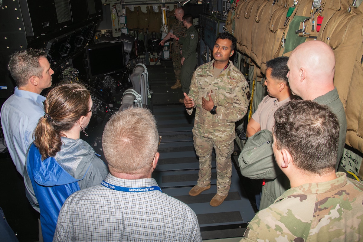 Members of the 71st National Security Forum tour a C-130 Greyhound on Maxwell Air Force Base, May 7, 2025.  The NSF is a Secretary of the Air Force sponsored event where attendees engage with U.S. and foreign national military officers and government civilians in a lecture and seminar structure to establish an environment for open engagements on the diplomatic, economic, informational, cultural, and military instruments of national power and how each benefits a more stable and prosperous world. (U.S. Air Force photo by Neo B. Greene III)